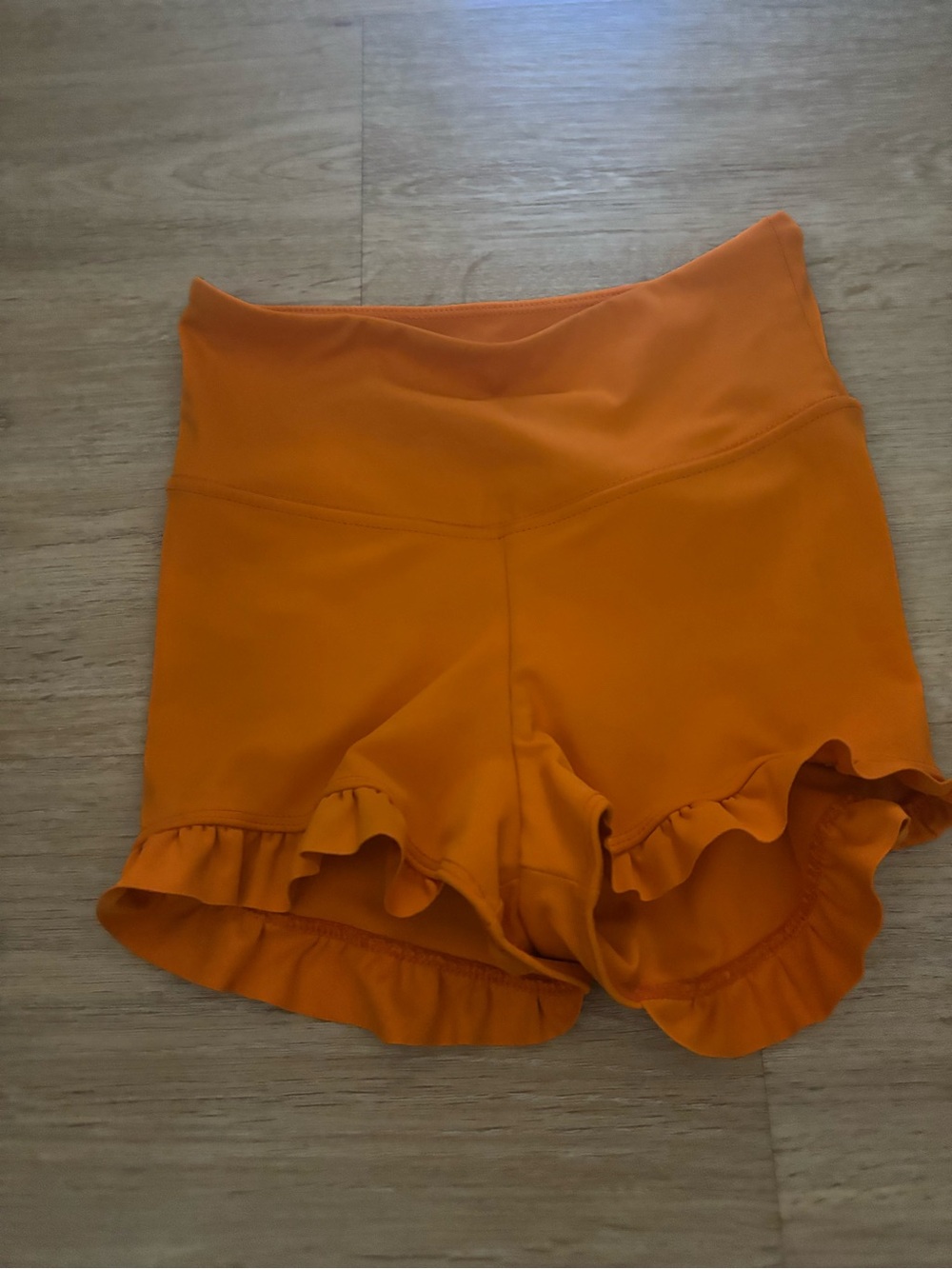 High-rise orange ruffle tiger friday dancewear shorts